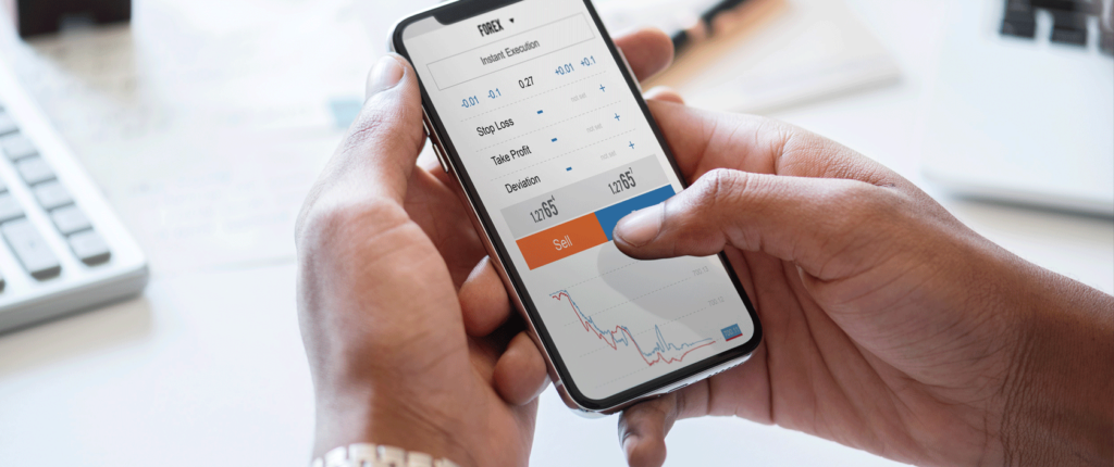 photo of an iphone looking at stocks