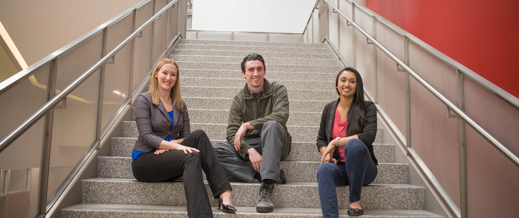Graduate certificate students on stairs