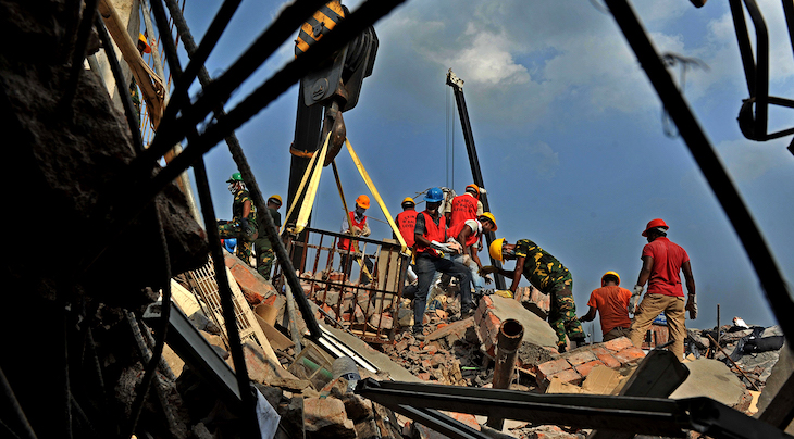 Aftermath of collapsed eight-story commercial building in Savar, Bangladesh.