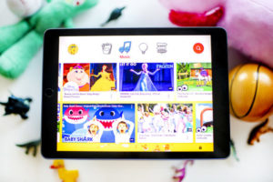 image of an iPad with children's cartoons and movies