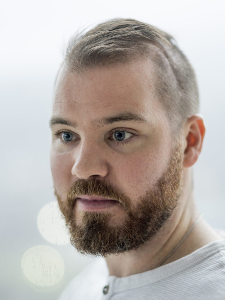 A headshot of Wade MacLeod looking pensive and not staring into the camera