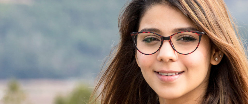 picture of girl wearing glasses with brown hair