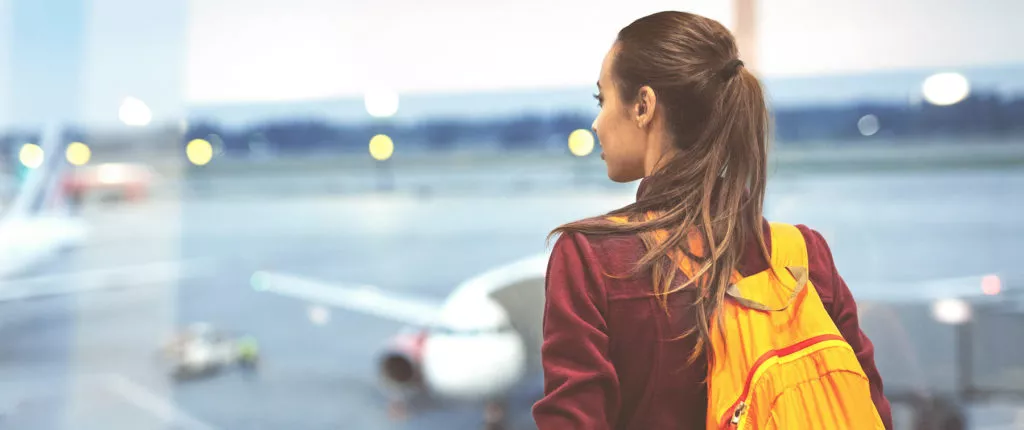 Girl at the airport window