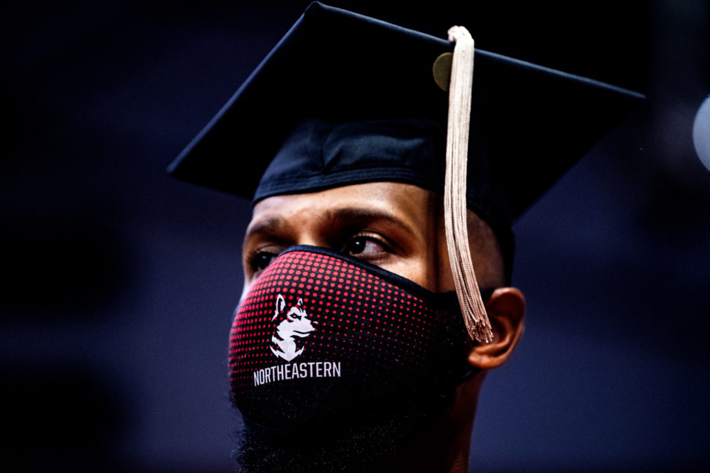 Masked Northeastern graduate