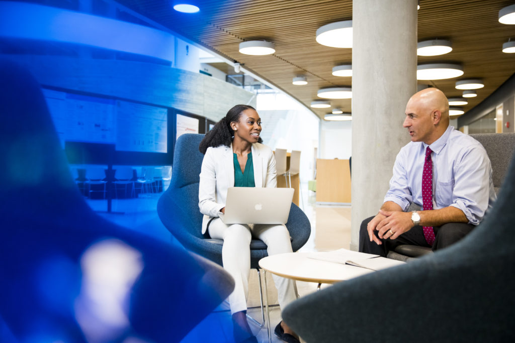 man and woman talking in ISEC