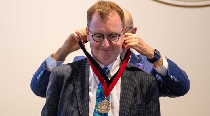 photo of a man receiving a medal