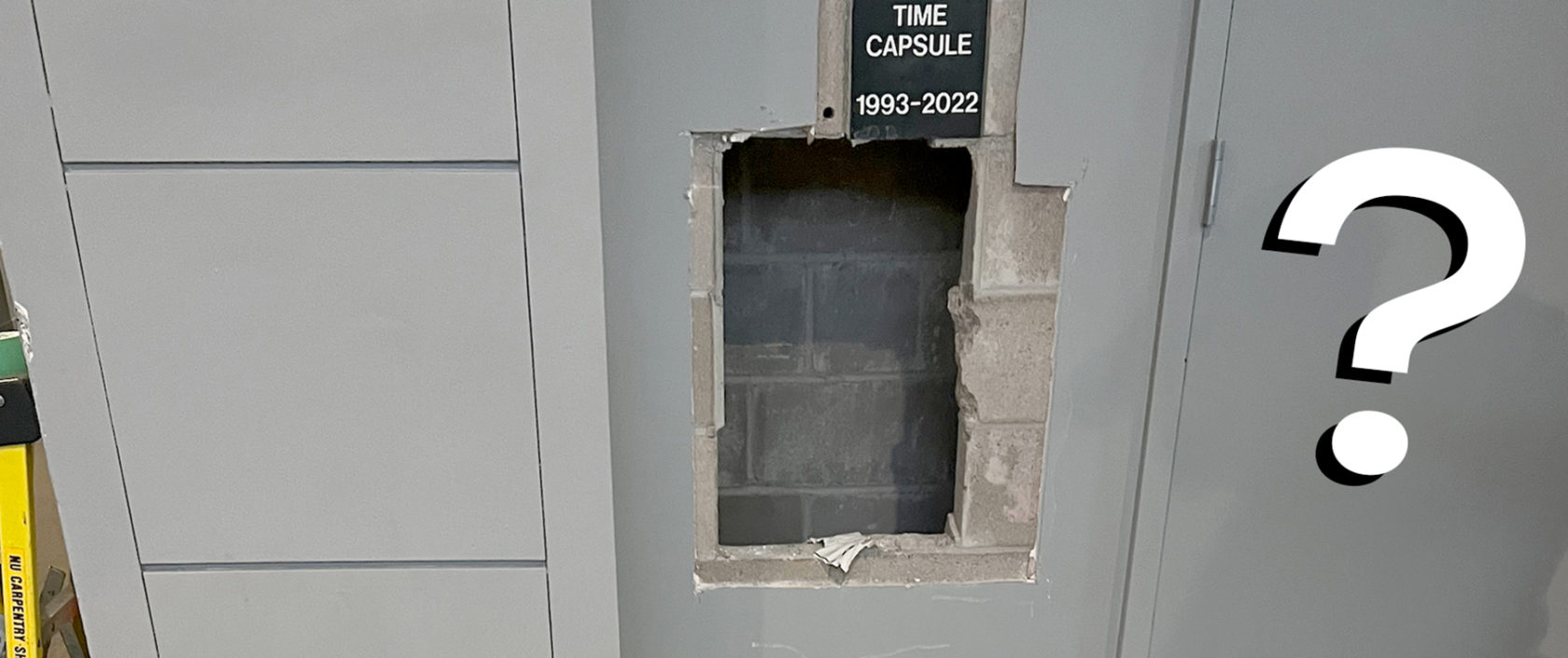 A hole in the wall in Dodge Hall where the time capsule was