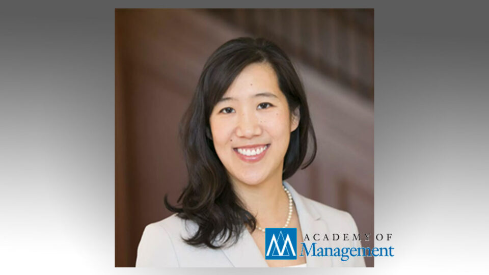 Professor Laura Huang's headshot with the Academy of Management logo