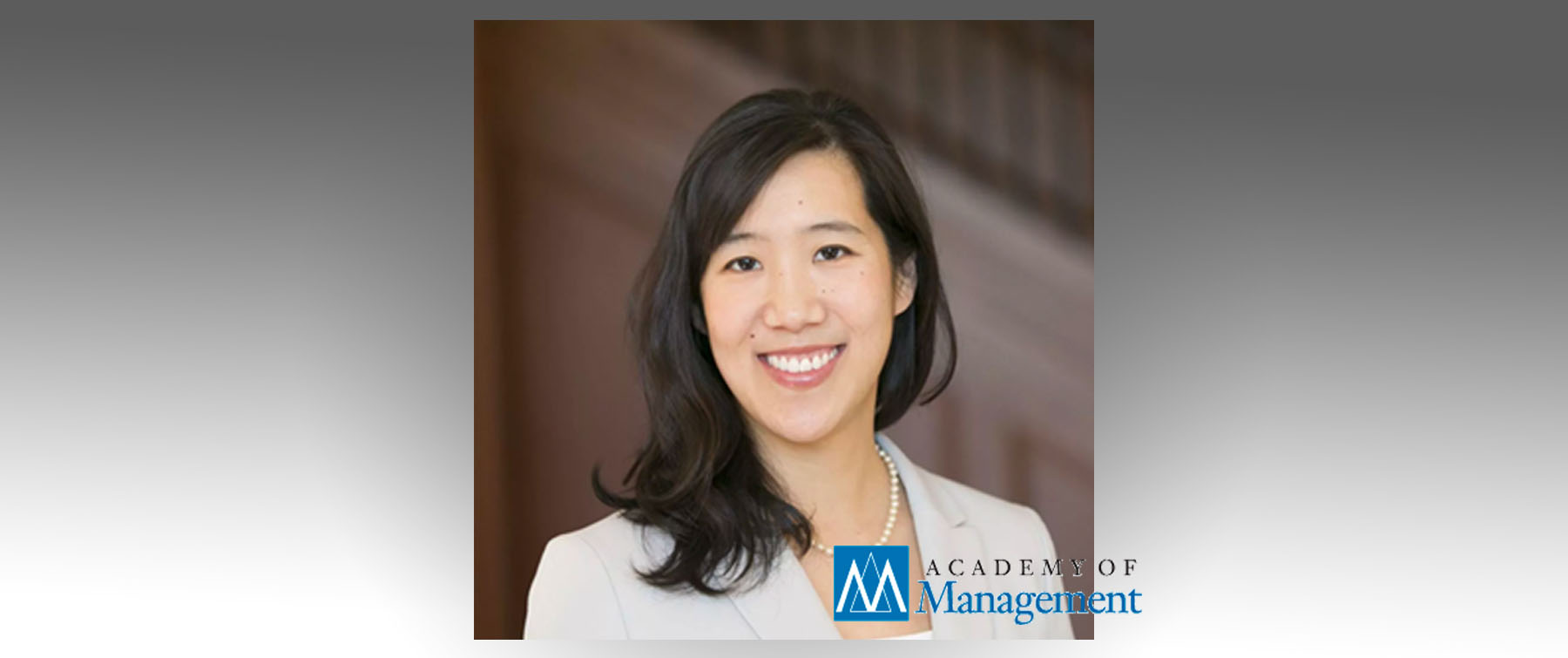 Professor Laura Huang's headshot with the Academy of Management logo
