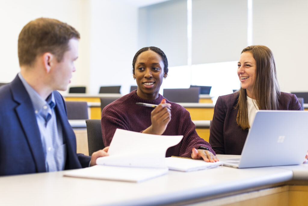 Three students talking