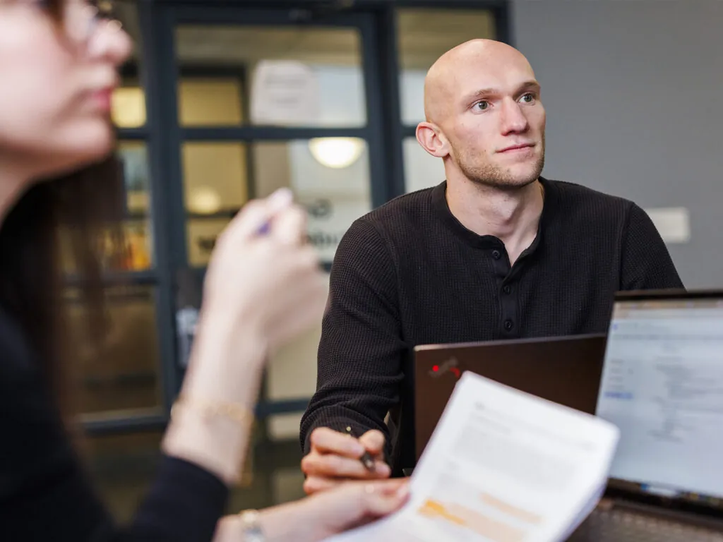 Two people in a meeting