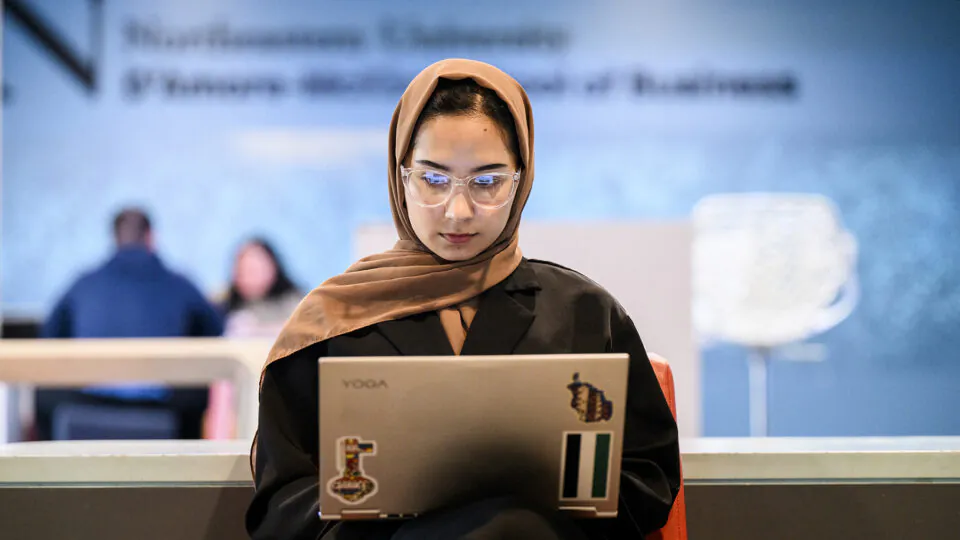 DMSB student with computer