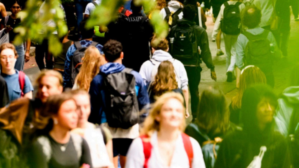 students rushing to class