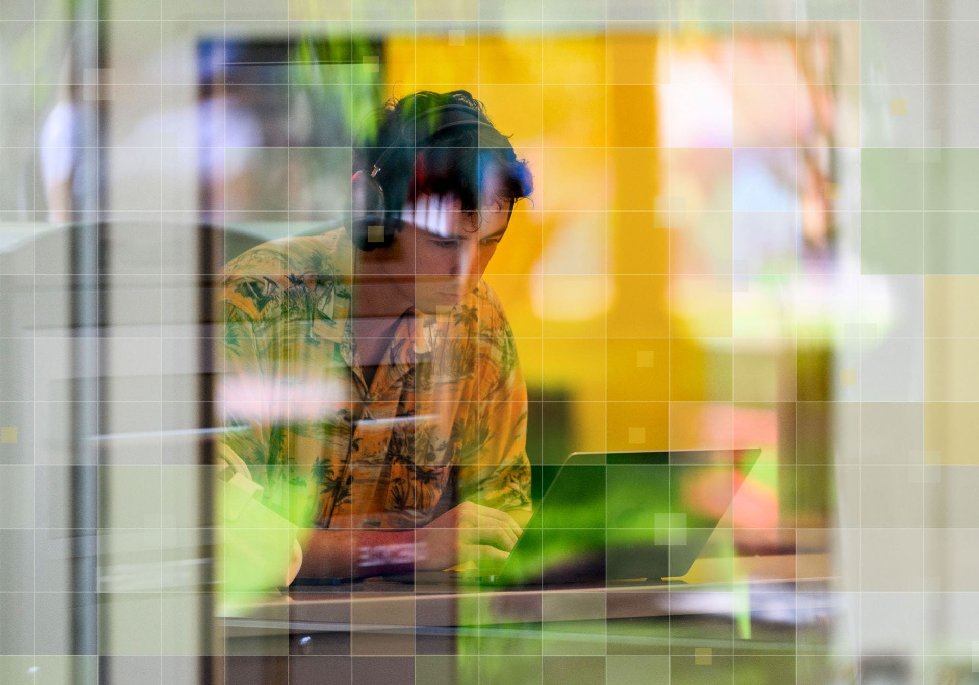 Student behind decorative glass window